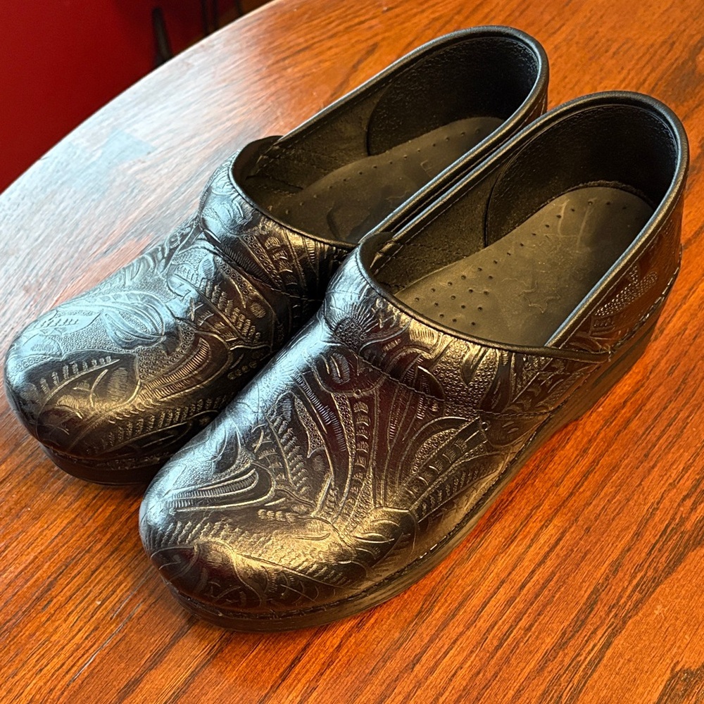Dansko Black Paisley Print Embossed Clogs